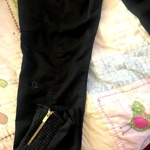 Jaanuu  black scrub pants medium has stretch very cute! Moto